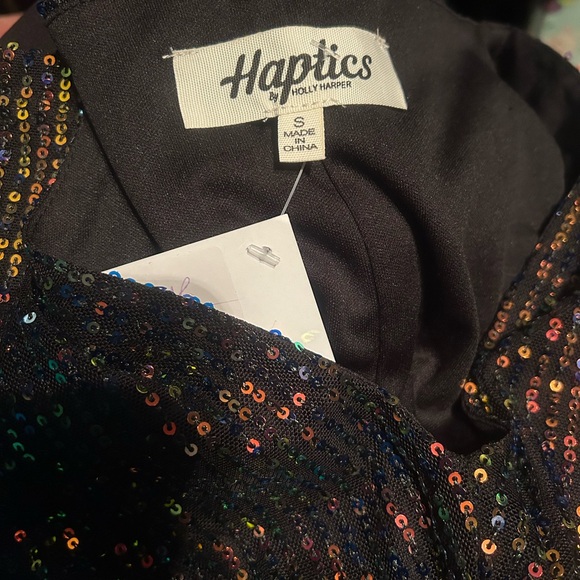 Black iridescent mini dress with v-neck design and dolman sleeves. - Picture 6 of 6